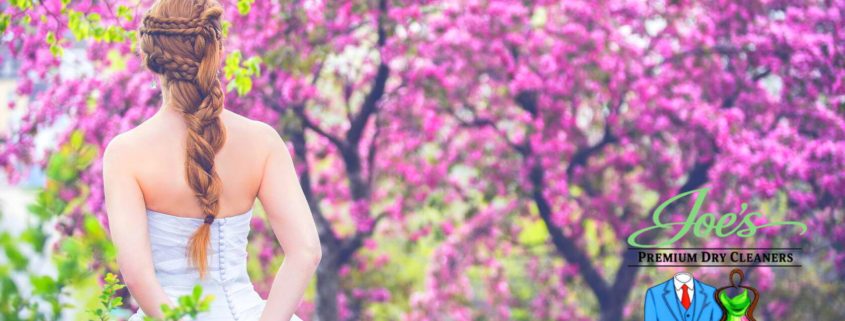 Prom dress receiving eco-friendly dry cleaning and careful inspection at Joe’s Organic Dry Cleaning & Tailoring Alterations in Westbury NY